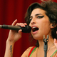 Amy Winehouse performing at Glastonbury Festival in 2007